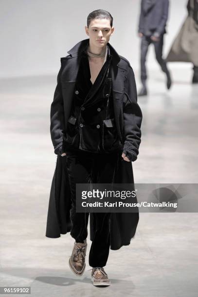 Model walks the runway at the Lanvin fashion show during Paris Menswear Fashion Week Autumn/Winter 2010 on January 24, 2010 in Paris, France.
