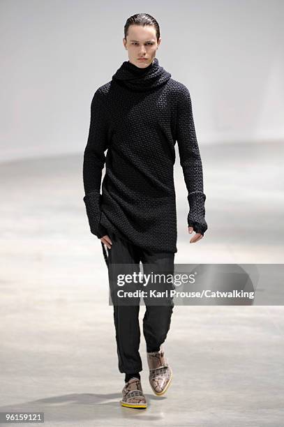 Model walks the runway at the Lanvin fashion show during Paris Menswear Fashion Week Autumn/Winter 2010 on January 24, 2010 in Paris, France.