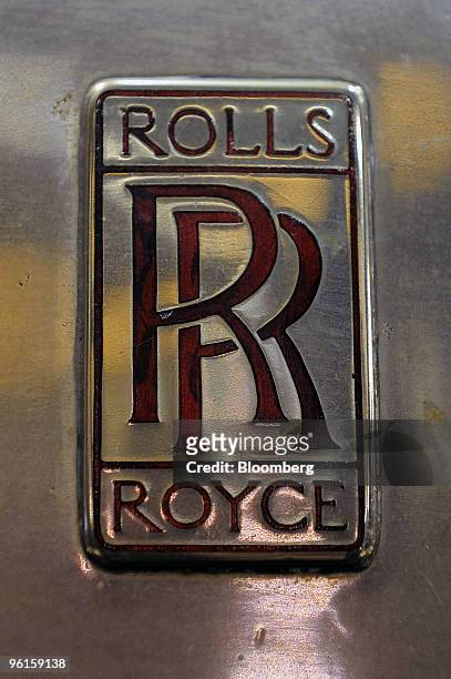 Rolls Royce logo is seen on a Rolls Royce Silver Ghost Tourer automobile on display at the Retromobile auto exhibition in Paris, France, on Saturday,...