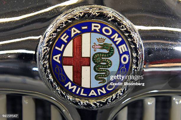 An Alfa Romeo logo is seen on an Alfa Romeo 6C GS Spider automobile on display at the Retromobile auto exhibition in Paris, France, on Saturday, Jan....