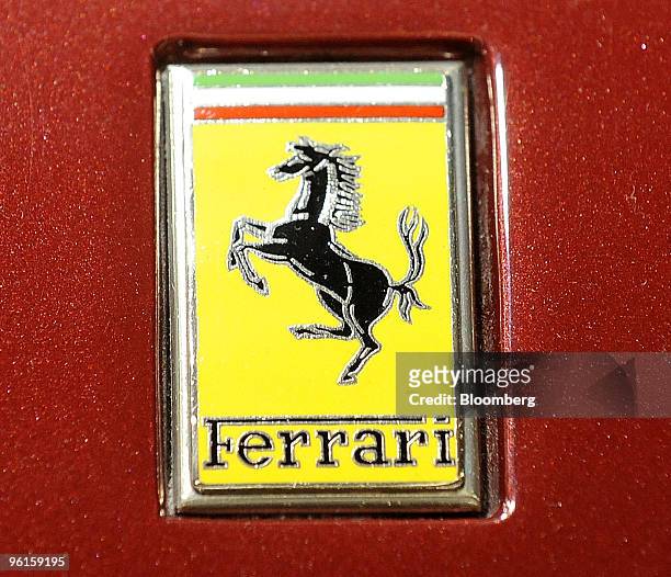 Ferrari logo is seen on a Ferrari Daytona Spider automobile on display at the Retromobile auto exhibition in Paris, France, on Saturday, Jan. 23,...