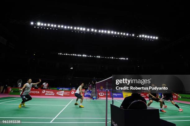 Takeshi Kamura and Keigo Sonoda of Japan compete against Lee Jhe Huei and Lee Yang of Chinese Taipei during Preliminary Round on day four of the BWF...