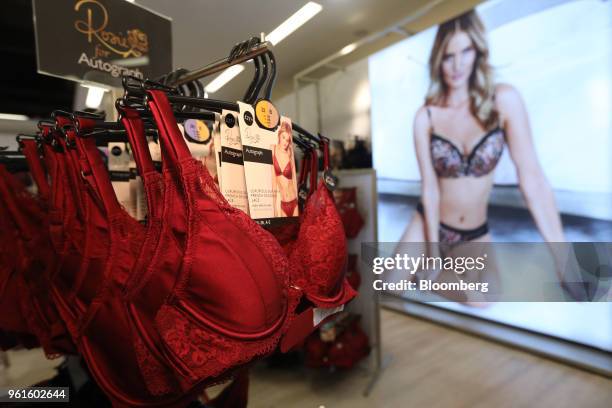 Womens underwear from the 'Autograph' clothing range hangs on display inside a branch of Marks & Spencer Group Plc in London, U.K., on Tuesday, Dec....