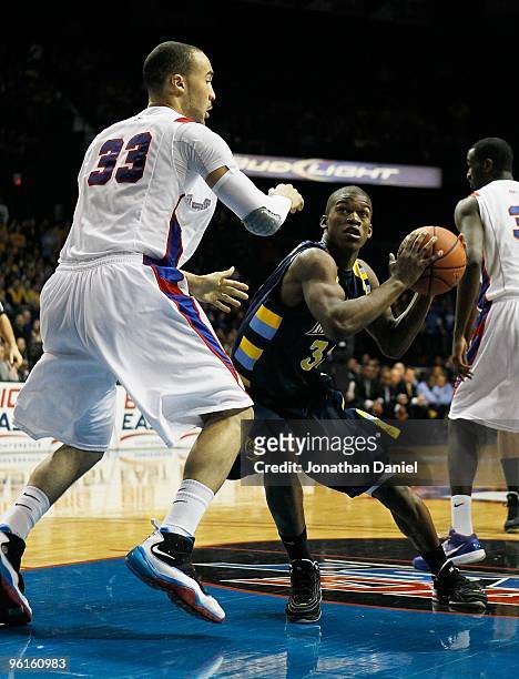 Jimmy Butler of the Marquette Golden Eagles moves to shoot against Krys Faber of the DePaul Blue Demons at the Allstate Arena on January 20, 2010 in...