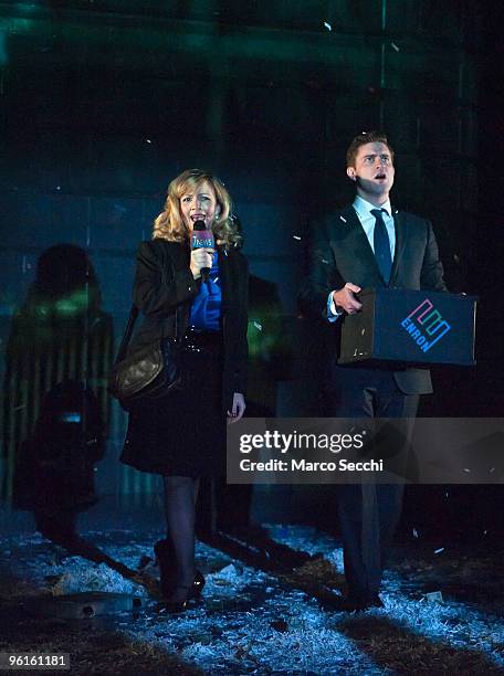 Gillian Budd plays a News Reporter and Tom Goodman Hill performs as Andy Fastow in Enron at the Noel Caward Theatre on January 25, 2010 in London,...