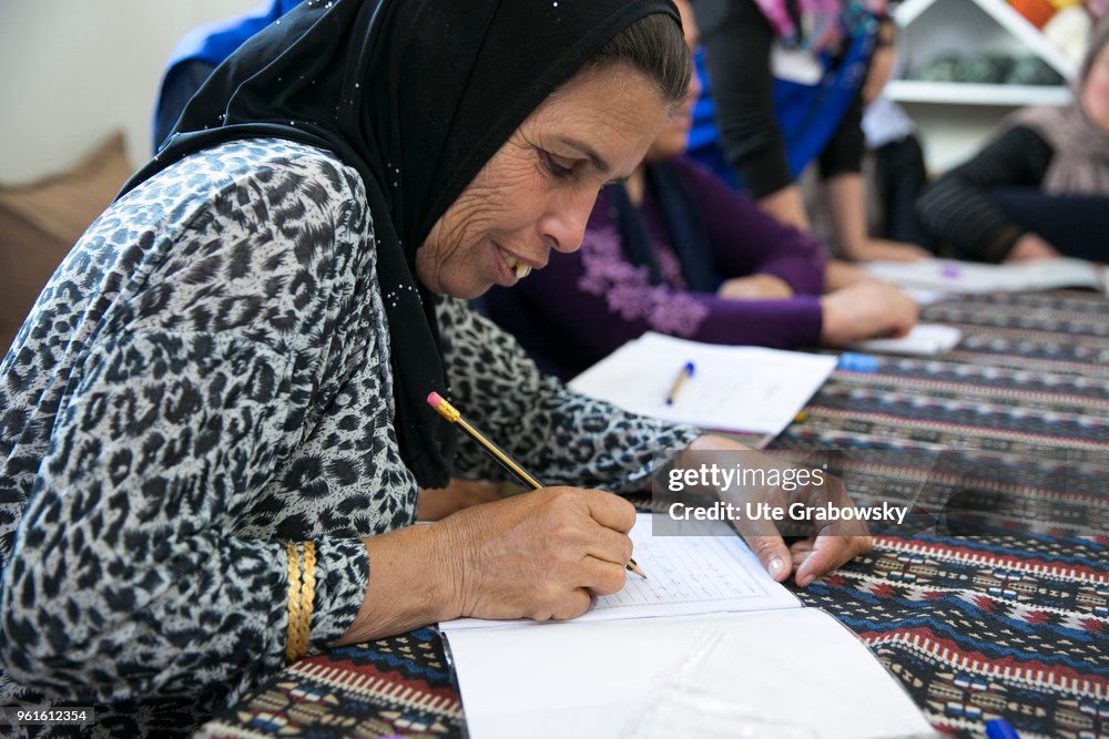 Literacy lessons in a refugee camp in Iraq