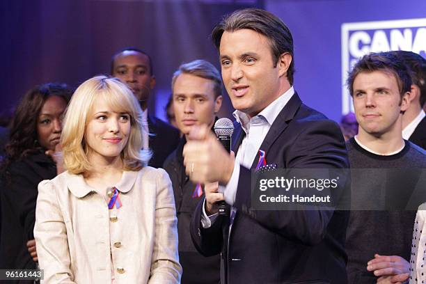 In this handout photo provided by Pimentel Photography, Actress Rachel McAdams and host Ben Mulroney attend the Canada For Haiti Benefit on January...