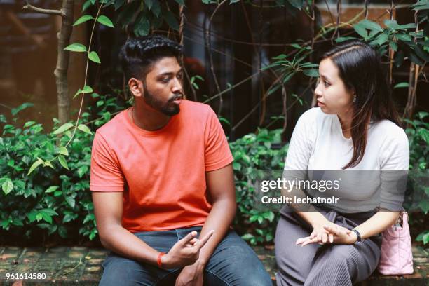 friends talking on the break from work or study - friends serious stock pictures, royalty-free photos & images