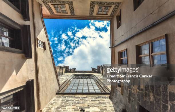 tyn church facade seen from directly below in prague, czech republic, a unesco heritage site - stained glass czech republic stock pictures, royalty-free photos & images