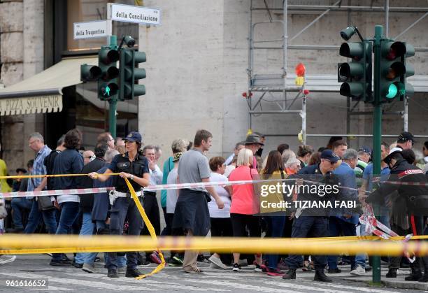 Police secure the area on the site of a bomb alert, on May 23, 2018 at the "Credito Artigiano" bank Via della Conciliazione near the Vatican during a...