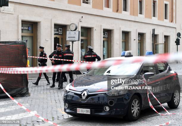 Carabinieri secure the area on the site of a bomb alert, on May 23, 2018 at the "Credito Artigiano" bank Via della Conciliazione near the Vatican...