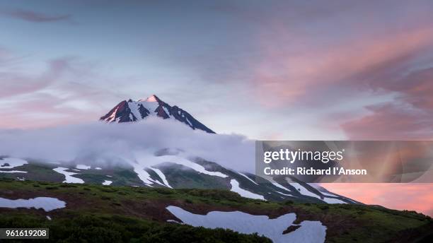 vilyuchinsk volcano at sunset - kamchatka volcano stock pictures, royalty-free photos & images
