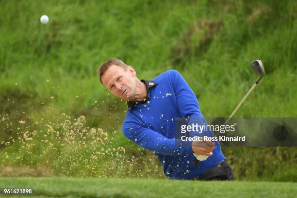 Teddy Sheringham hits from a bunker during the Pro Am for the BMW PGA Championship at Wentworth on May 23, 2018 in Virginia Water, England.