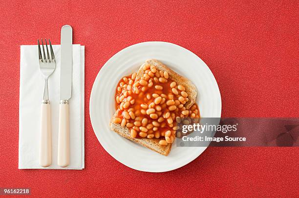 beans on toast - baked beans stock pictures, royalty-free photos & images