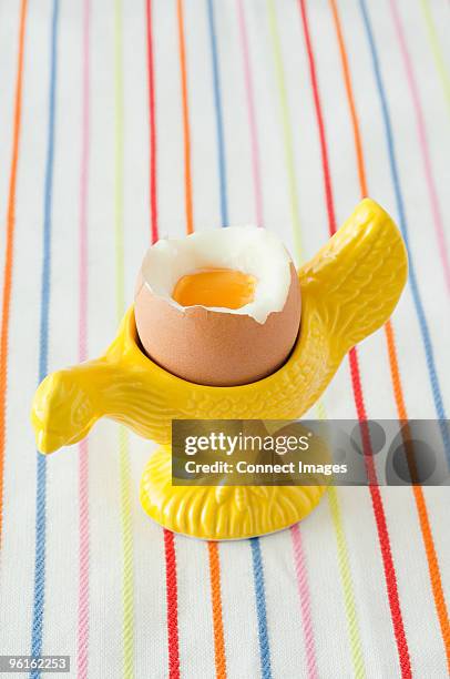 boiled egg in eggcup - egg cups stock pictures, royalty-free photos & images