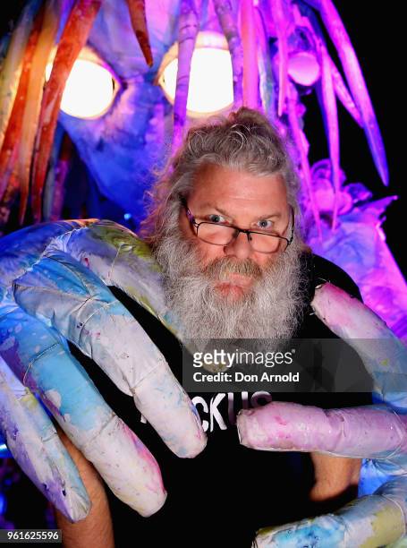 Creative Director of Erth Visual and Physical Inc. Scott Wright poses in front of the puppet creature Marri Dyin during a media preview for Vivid...