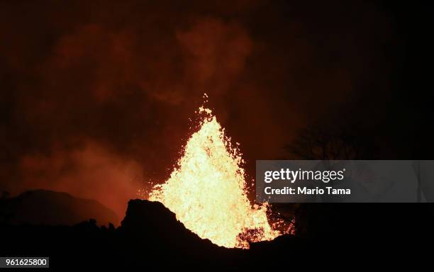 Lava erupts from a Kilauea volcano fissure on Hawaii's Big Island on May 22, 2018 in Kapoho, Hawaii. Officials are concerned that 'laze', a dangerous...