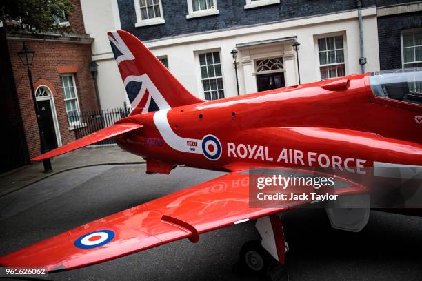 Royal Air Force Red Arrow jet sits outside Number 10 Downing Street to mark RAF 100 celebrations on May 23, 2018 in London, England. British Prime...