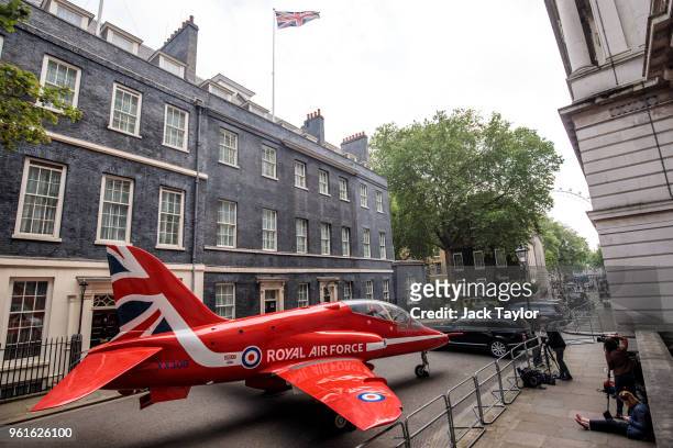 Royal Air Force Red Arrow jet sits outside Number 10 Downing Street to mark RAF 100 celebrations on May 23, 2018 in London, England. British Prime...