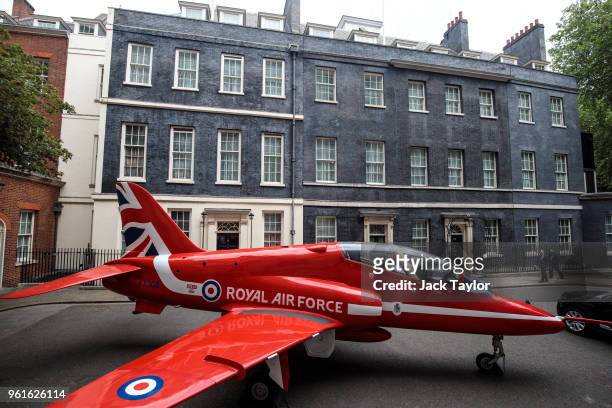 Royal Air Force Red Arrow jet sits outside Number 10 Downing Street to mark RAF 100 celebrations on May 23, 2018 in London, England. British Prime...