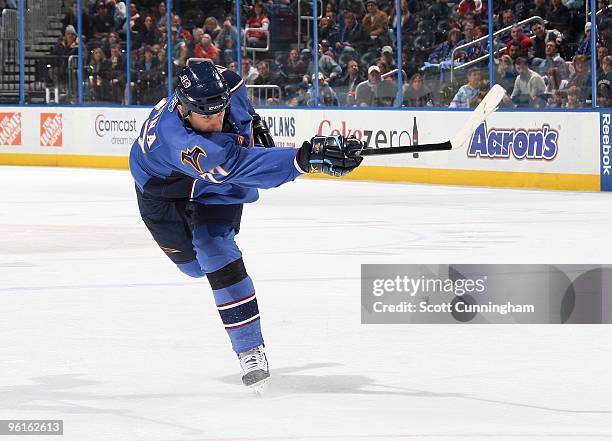 Pavel Kubina of the Atlanta Thrashers fires the puck against the Washington Capitals at Philips Arena on January 9, 2010 in Atlanta, Georgia.