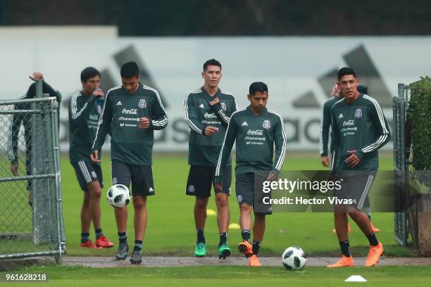 Raul jimenez, Jesus Molina, Javier Aquino and Edson Alvarez of Mexico walk during a training session as part of the preparation for FIFA Russia 2018...