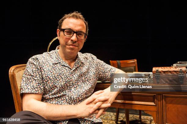 Spanish stage director Sergi Belbel poses for a photo shoot on stage at La Abadia Theatre on May 17, 2018 in Madrid, Spain.