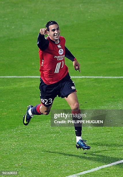 Lille's French defender Adil Rami celebrates after scoring during the French L1 football match Lille vs. Nantes on November 01 at The Lille metropole...