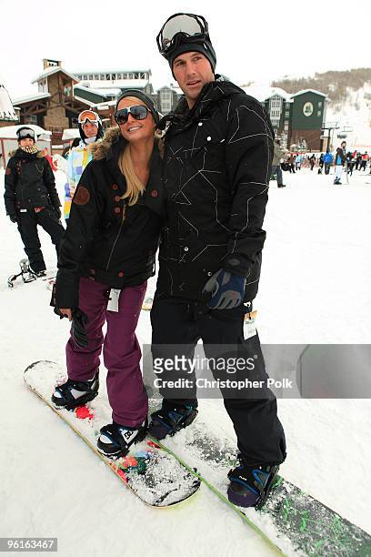 Paris Hilton and Doug Reinhardt attend Oakley "Learn To Ride" Snowboard fueled by Muscle Milk at Oakley Lodge on January 23, 2010 in Park City, Utah.