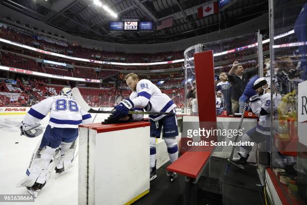 Washington, DC Goalie Andrei Vasilevskiy and Steven Stamkos of the Tampa Bay Lightning walk out to the ice before the game against the Washington...