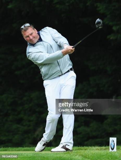 Former Olympic rower Sir Matthew Pinsent tees off during the BMW PGA Championship Pro Am tournament at Wentworth on May 23, 2018 in Virginia Water,...