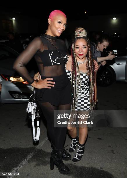 Tamar Braxton and Tameka "Tiny" Harris attend PrettyLittleThing x Karl Kani Afterparty at Murano on May 22, 2018 in Los Angeles, California.