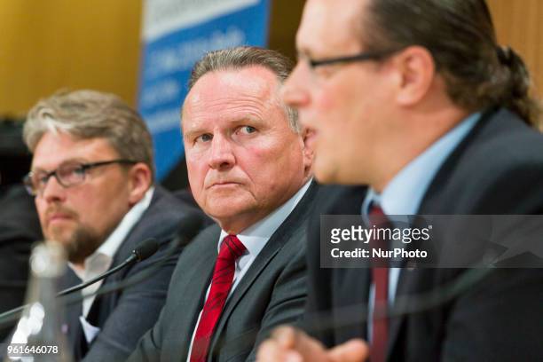 Guido Reil, Georg Pazderski, and Steffen Koeniger of Anti-immigration populist Alternative fuer Deutschland party holds a press conference regarding...