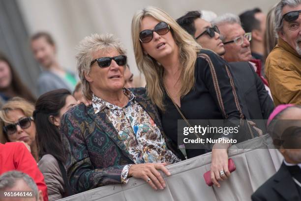 Rod Stewart and his partner Penny Lancaster walk away after attending Pope Francis' general audience in St. Peter's Square at the Vatican, Wednesday,...