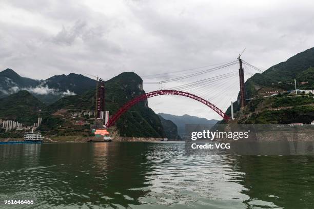 Photo shows the construction site of Xiangxi Bridge over the Yangtze River on May 22, 2018 in Yichang, China. Xiangxi Yangtze River Bridge is a...