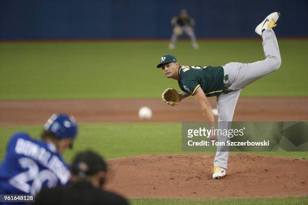 Sean Manaea of the Oakland Athletics delivers a pitch to Josh Donaldson of the Toronto Blue Jays in the first inning during MLB game action at Rogers...