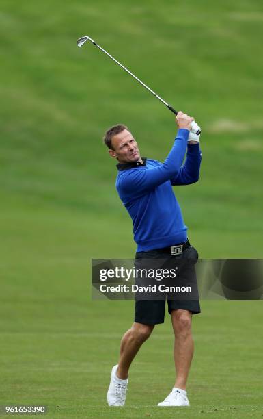 Teddy Sheringham the former England and Premier League soccer star plays a shot during the pro-am for the 2018 BMW PGA Championship on the West...