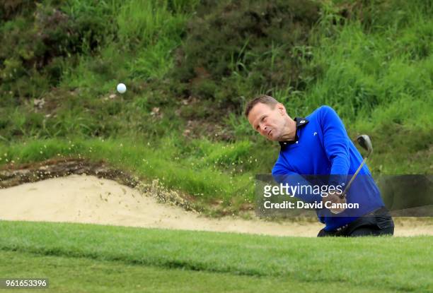Teddy Sheringham the former England and Premier League soccer star plays a shot during the pro-am for the 2018 BMW PGA Championship on the West...