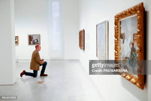 Journalist takes notes during the presentation of the exhibition "Picasso's Kitchen" by Spanish artist Pablo Picasso at the Picasso Museum in...