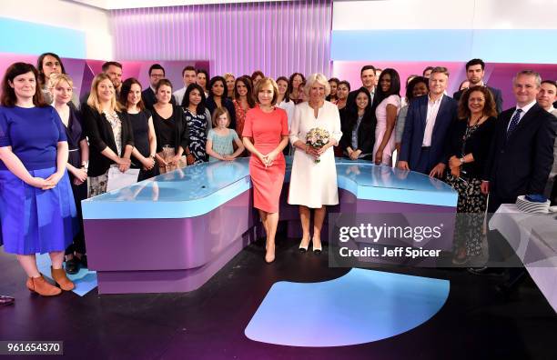 Camilla, Duchess of Cornwall poses with journalists, including News Anchor Sian Williams and members of the crew as she visits the headquarters of...