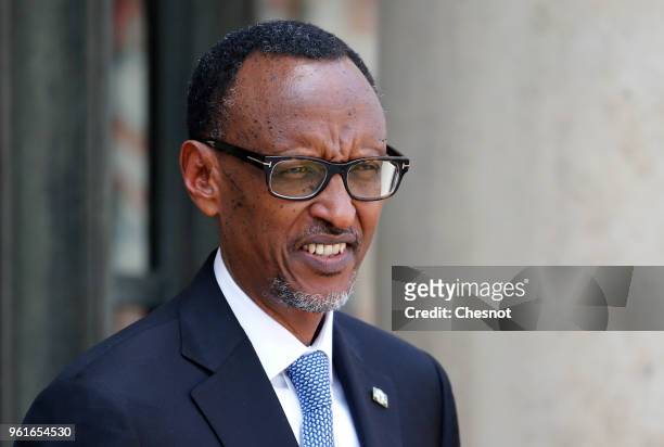 President of Rwanda Paul Kagame poses as he arrives at the Elysee Presidential Palace for a meeting with French President Emmanuel Macron on May 23...