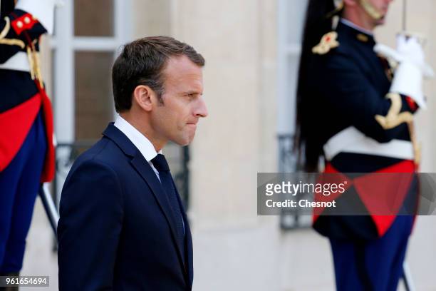 French President Emmanuel Macron waits for President of Rwanda Paul Kagame prior to their meeting at the Elysee Presidential Palace on May 23 in...