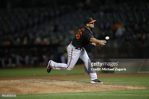 Darren O'Day of the Baltimore Orioles pitches during the game against the Oakland Athletics at the Oakland Alameda Coliseum on May 4, 2018 in...