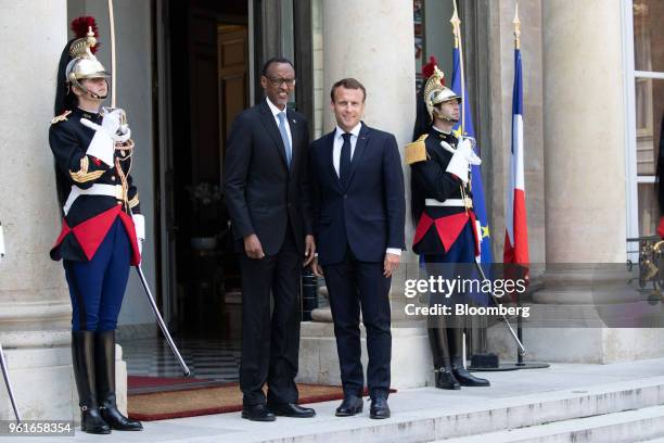 Paul Kagame, Rwanda's president, left, arrives for a meeting with Emmanuel Macron, France's president, at the Elysee Palace, in Paris, France, on...