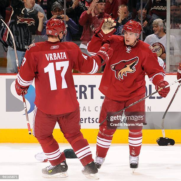 Scottie Upshall and Radim Vrbata of the Phoenix Coyotes celebrate a goal against the Nashville Predators on January 21, 2010 at Jobing.com Arena in...