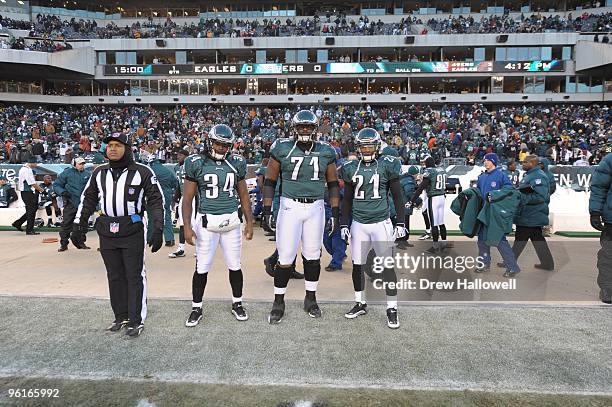 Running back Eldra Buckley, offensive tackle Jason Peters and cornerback Joselio Hanson of the Philadelphia Eagles pose for a captains photograph...