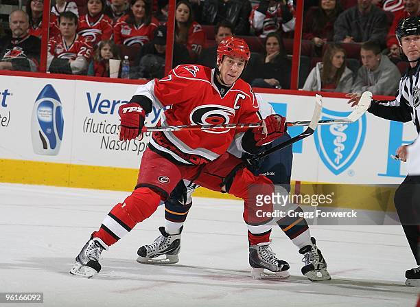 Rod Brind'Amour of the Carolina Hurricanes battles for position on the ice against the Atlanta Thrashers during a NHL game on January 16, 2010 at RBC...