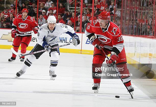 Jussi Jokinen of the Carolina Hurricanes skates with the puck during a NHL game against the Tampa Bay Lighting on January 18, 2010 at RBC Center in...