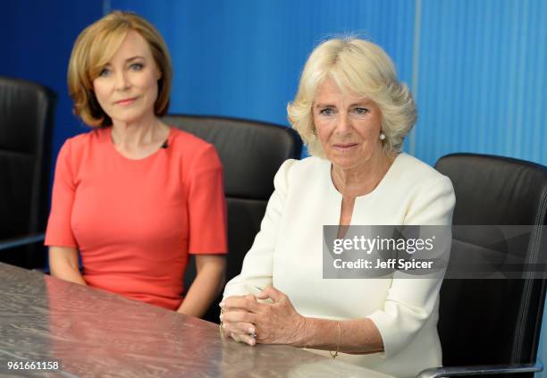 Camilla, Duchess of Cornwall speaks members of the 5 News team, including journalist Sian Williams as she visits the headquarters of Independent...