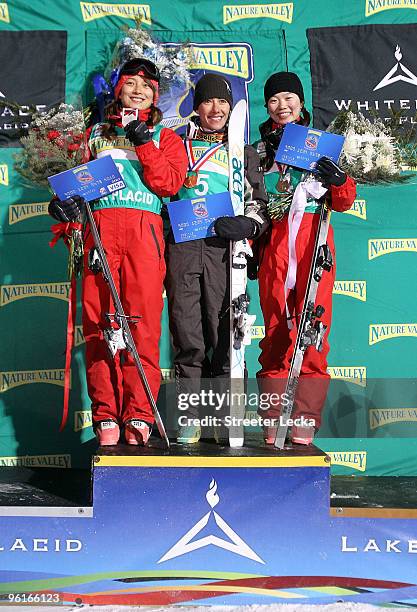 Ll Nina of China Lydia Lassila of Australia and Zin Zhang of China celebrate on the podium after the 2010 Freestyle World Cup aerials competition at...